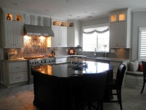 White kitchen cainets with stainless appliances